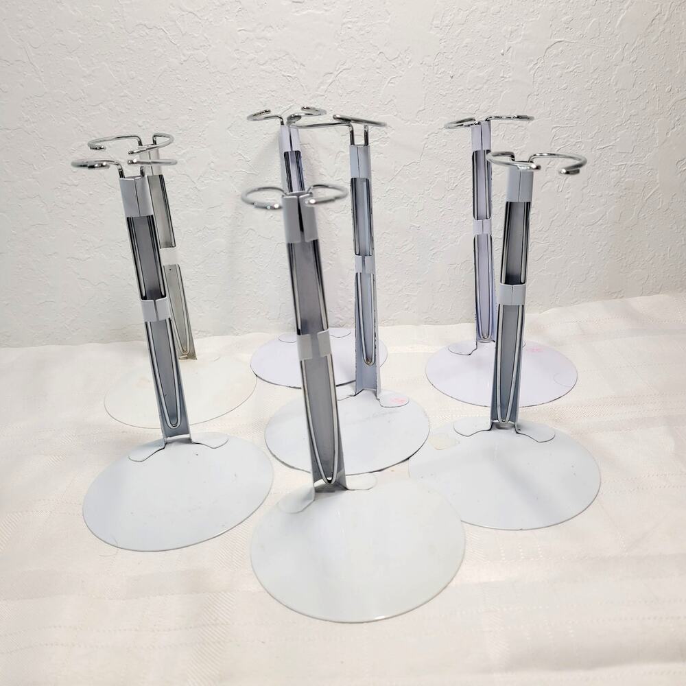Lot of 7 Vintage Metal Doll Stands Fits 14" to 20" Dolls - Height 7" to 10.5"
